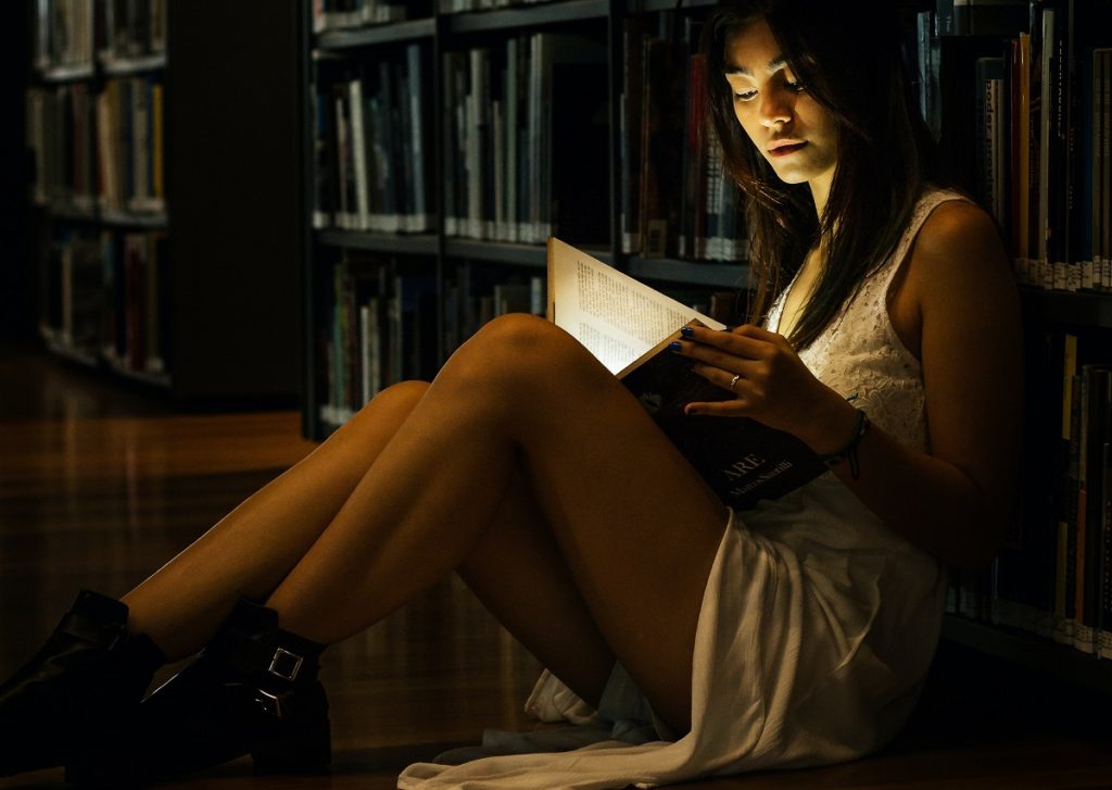 Photo by Luriko Yamaguchi: https://www.pexels.com/photo/woman-leaning-on-bookshelf-2761017/